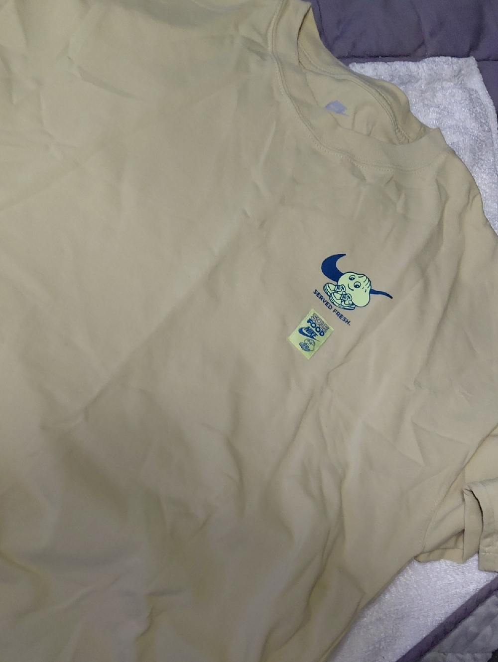 Nike Pale Yellow Tee with Blue Graphic